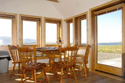 Sunny eat-in kitchen wth stunning open views